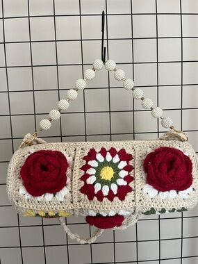 Handmade Crochet Clutch Bag with Red Floral Accents